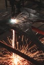 Sparks from a metal cutting machine in a factory. Royalty Free Stock Photo