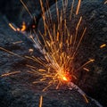 The sparks radiate outwards creating dynamic lines and a warm glow Royalty Free Stock Photo