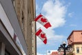Sparks street view with canadian flags on buildings in downtown district of Ottawa in Canada