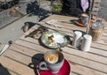 Sparrows scavenge outdoor cafe tables Royalty Free Stock Photo