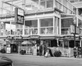 Sparsely occupier off season beach restaurant Royalty Free Stock Photo