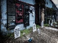 Funny Halloween decorations in front of a haunted house