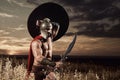 Spartan warrior going forward in attack with sword. Royalty Free Stock Photo