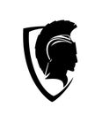 Spartan warrior head inside black and white vector heraldic shield design Royalty Free Stock Photo