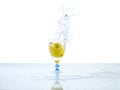 Spashing water on glass with lemon