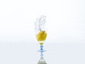 Spashing water with lemon on glass Royalty Free Stock Photo