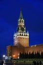 Spasskaya clock tower of Moscow Kremlin at snowfall. Popular landmark.