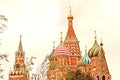 Spasskaya tower of Moscow Kremlin and St. Basil`s Cathedral Royalty Free Stock Photo