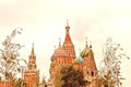 Spasskaya tower of Moscow Kremlin and St. Basil`s Cathedral Royalty Free Stock Photo