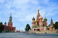 Spasskaya Tower of Moscow Kremlin and St. Basil`s Cathedral is an Orthodox church on Red Square Royalty Free Stock Photo