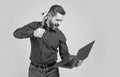 Spate of cyberattack. Hacker assaulting computer with hammer. Targeted cyberattack