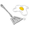 Spatula flipping egg