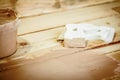 Spatula and putty for puttying wood, on the boards background