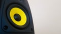 Speaker background. Woofer, yellow subwoofer close-up. Professional studio equipment. Vocal monitor for mixing and recording music Royalty Free Stock Photo