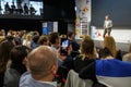 Speaker at Business Conference and Presentation. Audience at the conference hall. The man keeps a record on the Royalty Free Stock Photo