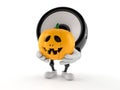 Speaker character holding jack o lantern