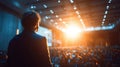 Speaker Delivering Engaging Talk in Conference Hall at Sunset Royalty Free Stock Photo