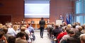 Speaker giving presentation on scientific business conference. Royalty Free Stock Photo