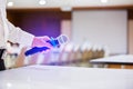 The speaker held the microphone in his hand with blurry conference room and projector Royalty Free Stock Photo