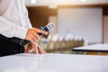 The speaker held the microphone in his hand with blurry conference room and projector Royalty Free Stock Photo