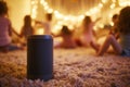 speaker on a home carpet, blurry kids bopping at a slumber party