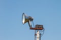 Speaker megaphone white on pole Royalty Free Stock Photo