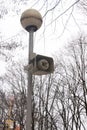 Speaker on a pole in the park Royalty Free Stock Photo