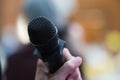 Speaker speaking on Microphone in Conference room or seminar meeting hall in business event or academic classroom training in Royalty Free Stock Photo