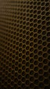 The speaker surface mesh is golden brown Royalty Free Stock Photo