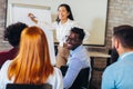 Speaker talking in seminar with many of audiences