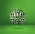 Speakers sphere on a green studio background Royalty Free Stock Photo