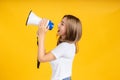 Speaking Loud noise announce of young asian woman with megaphone