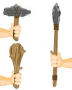 Spear with axe and bat of the stone age in hand of the person
