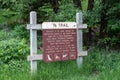 SIgn for the 76 Trail, a hiking trail leading to a panoramic view of the Spearfish Canyon