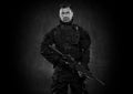 Spec ops police officer SWAT in black uniform studio Royalty Free Stock Photo