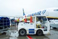 Special airport transport, loading passengers` luggage on the plane Royalty Free Stock Photo