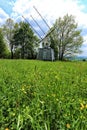 Special antenna radiotelescope behind the meadow Royalty Free Stock Photo