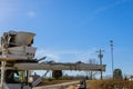 A special concrete mixing truck is delivered to the construction site following the outpouring of concrete mix on the