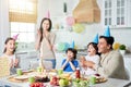 Special day. Joyful hispanic family with children looking happy, clapping while celebrating birthday together at home Royalty Free Stock Photo