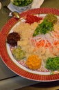 A special dish during Chinese New Year called Yusheng or Yee Sang Royalty Free Stock Photo