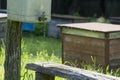 A special drinking bowl for bees in the apiary. Wooden board with a groove for fresh water