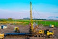 Special equipment for drilling an oil well in an oil field. Workover rig working on a previously drilled well trying to restore