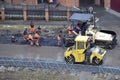 Special equipment on repair of roads. Bulldozer, asphalt spreader