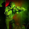 Special forces soldier with gas mask during night mission Royalty Free Stock Photo