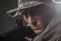 Special forces soldier man with Machine gun on a dark background