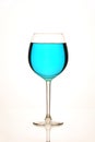 special full blue wine glass on a white background Royalty Free Stock Photo