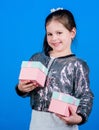 Special happens every day. Girl with gift box blue background. Black friday. Shopping day. Cute child carry gift box Royalty Free Stock Photo