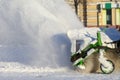 Special machine for snow removal cleans the road Royalty Free Stock Photo