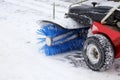 Special machine for snow removal cleans the road Royalty Free Stock Photo