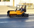 Special machinery asphalt roller . Asphalt paver, road repair vehicle. Photo